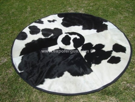 Special round black and white cowhide rug