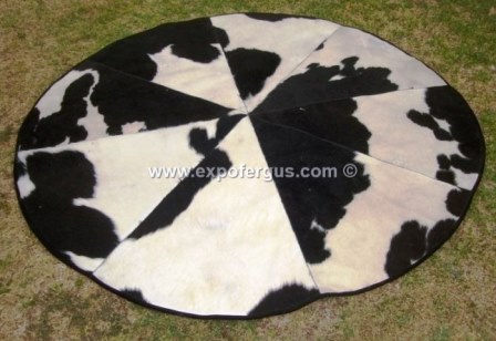 Round Black & White cowhide rug