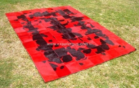 Red dyed cowhide rug