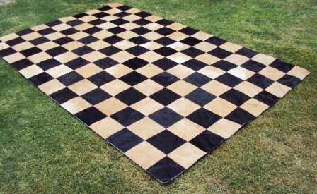 Checkerboard beige/black cowhide rug