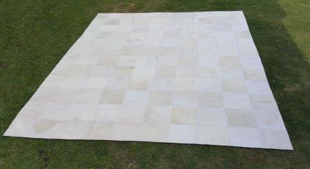 white cowhide rug