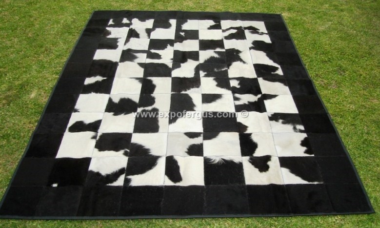 Black and white cowhide rug