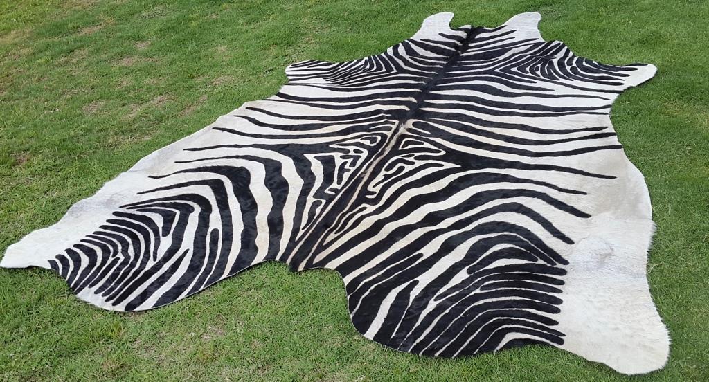 Zebra cowhide rug