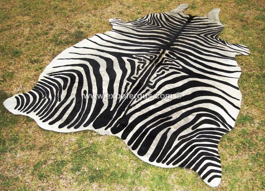 Zebra cowhide rug